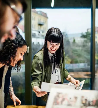 Close-up shot of a young casual businesswomen in a team meeting