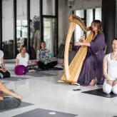 Berlin Yoga Conference accompanied by soothing harp melody
