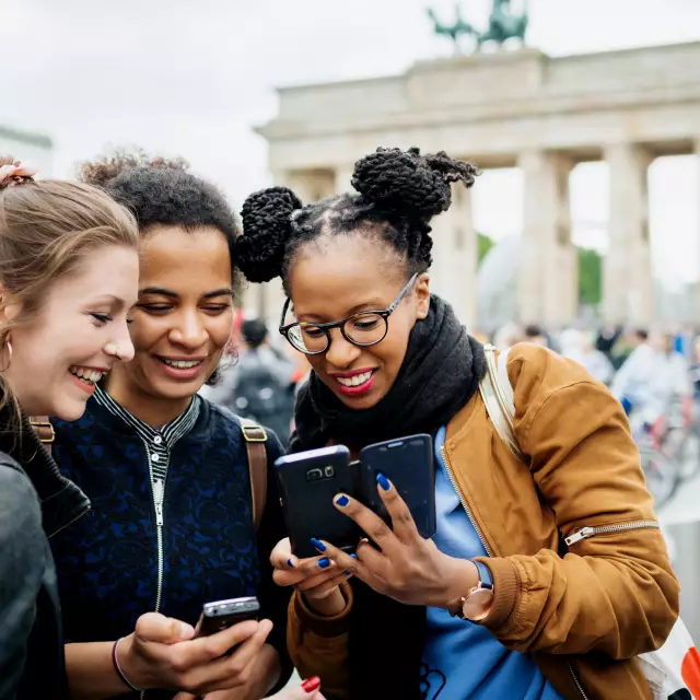 A Group Of Friends Exploring Berlin