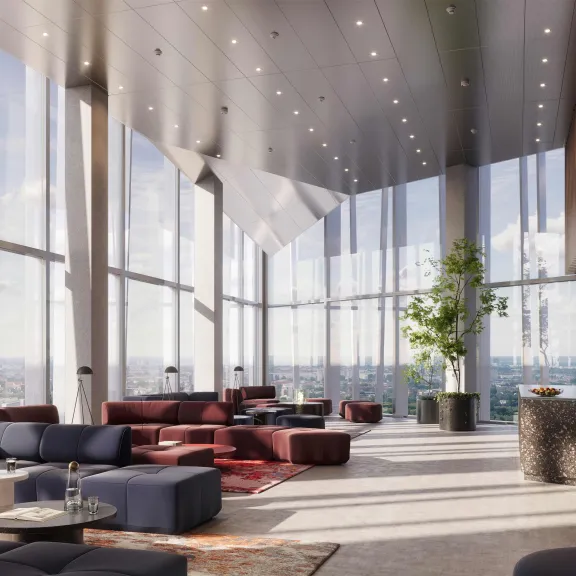 Modernes, lichtdurchflutetes Wohnzimmer mit großen Fenstern und stilvollen Sofas.