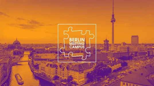 View over Berlin with the TV tower, Spree river and Berlin Cathedral, as well as the Berlin Meeting Campus logo