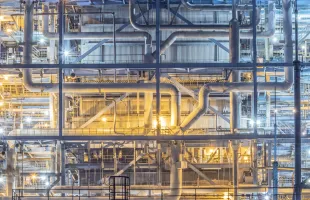 Close-up of a power plant facility with pipelines