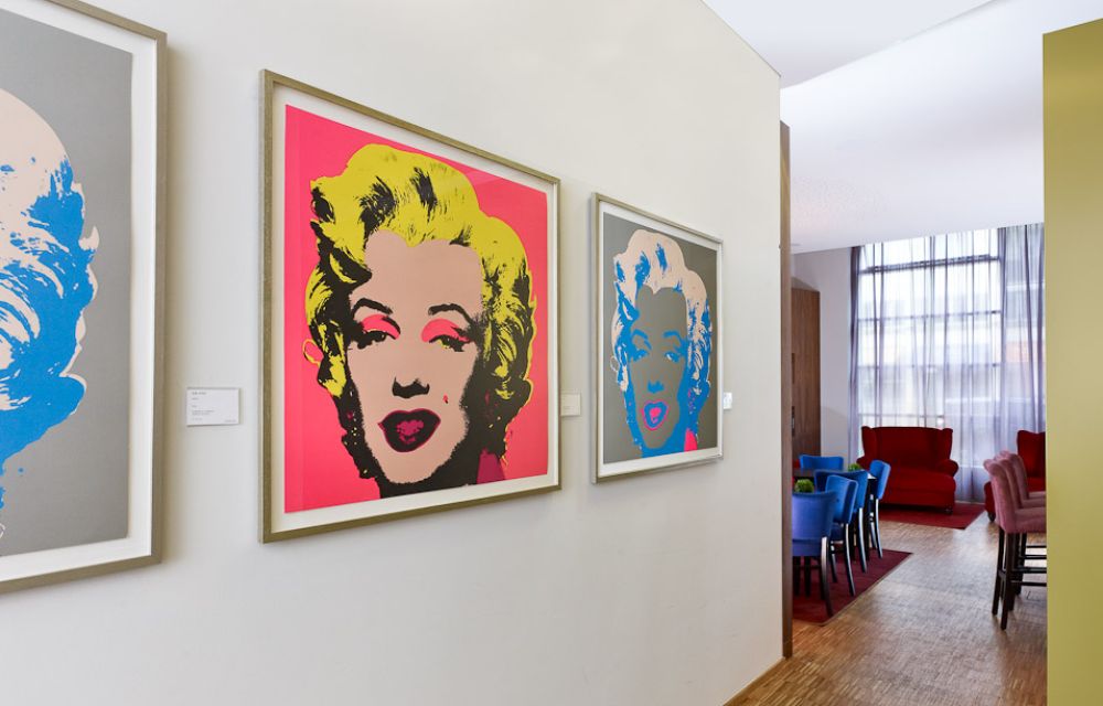 Lobby area with pictures of Marlene Dietrich in the conference hotel art'otel berlin kudamm in Berlin