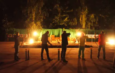 Archery in torchlight