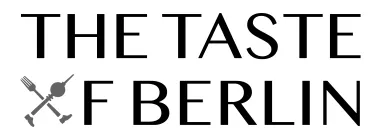 Logo with text "THE TASTE OF BERLIN" and a fork and spoon crossed for the letter O.