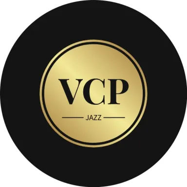 Gold VCP Jazz logo on a black circular background.