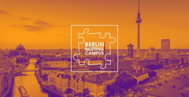 Panoramic view of Berlin featuring the Berlin Cathedral, the Spree River, and the TV Tower. The image is overlaid with an orange-purple color filter. Centered in the foreground is the “Berlin Meeting Campus” logo in the shape of a puzzle piece.