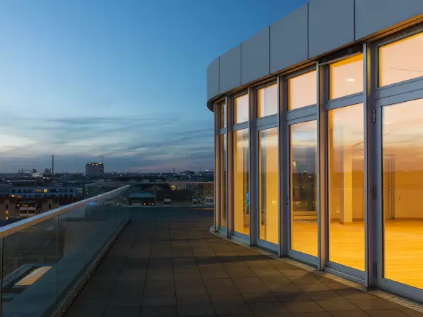 Roof terrace at sunset with a view of Berlin