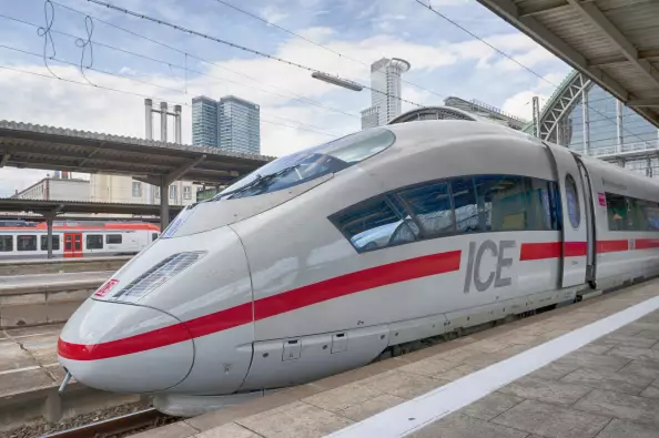Arrive relaxed and climate-neutral with the Deutsche Bahn event ticket Sustainable journey with the Deutsche Bahn ICE 3 train to Berlin's main railway station.
