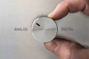 Digital to analog switcher Finger turns the switch from digital to analog