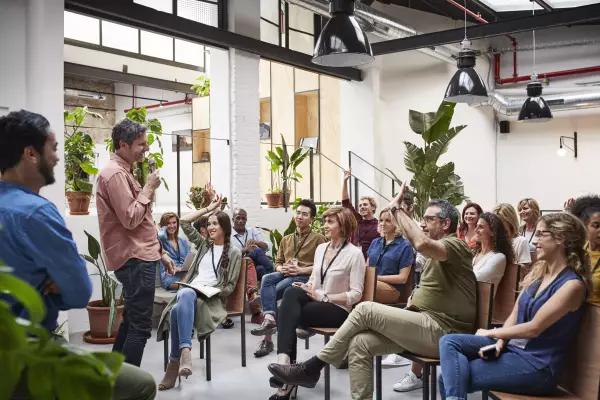 Interactive business meeting in a relaxed atmosphere Interactive business meeting in a relaxed atmosphere with plants in the background