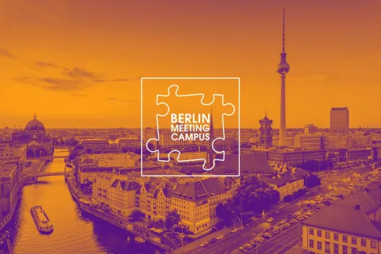 View over Berlin with the TV tower, Spree river and Berlin Cathedral, as well as the Berlin Meeting Campus logo