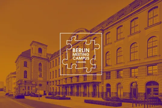 Historic building on Chausseestraße in Berlin with Berlin Meeting Campus logo